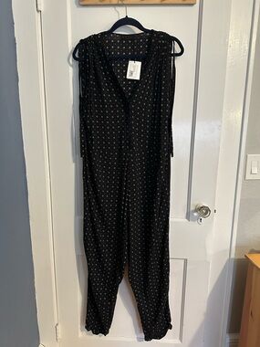NWT - HATCH maternity Black Sleeveless Jumpsuit with white flower detail. Size 3
